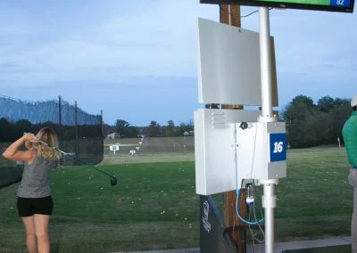 Person swinging at the driving range